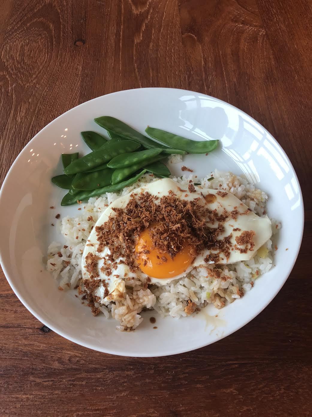 Fried Rice with Sunny-Side-Up Egg Topped with Crisped Ginger and Garlic