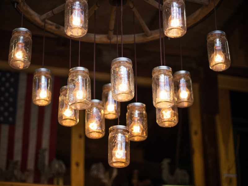 Chandelier Made from Upcycled Wagon Wheel and Mason Jars