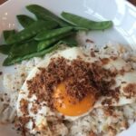 Fried Rice with Sunny-Side-Up Egg, Crisped Ginger, and Garlic